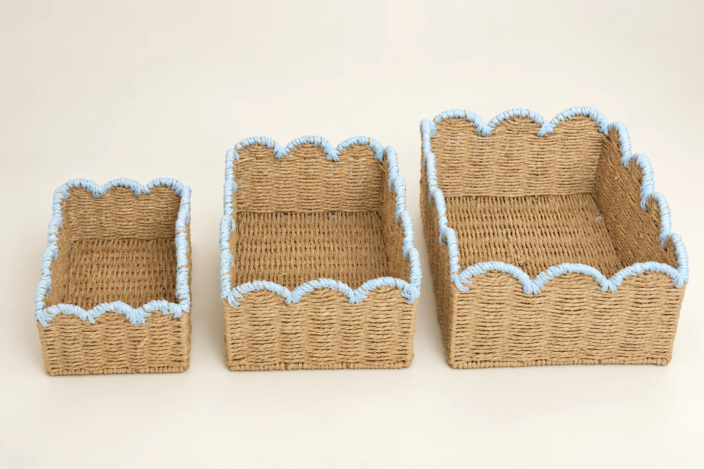 Three light-blue-trim paper rope basket samples shown separately from small to large